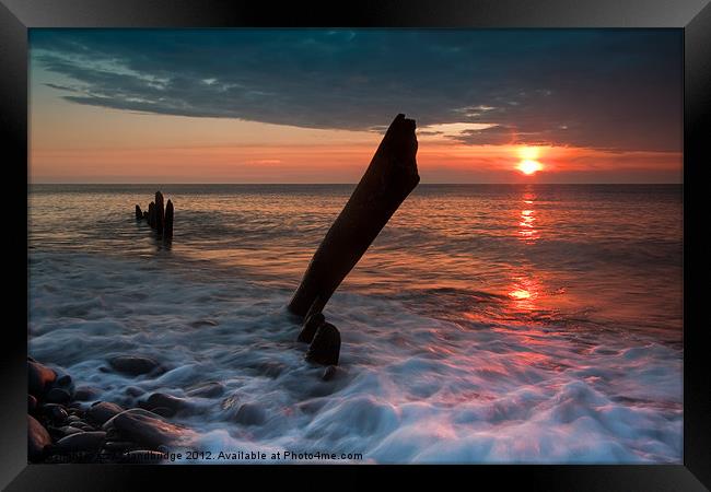 Posts at sunset Framed Print by Izzy Standbridge