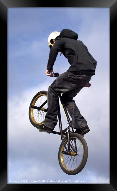 Bike Stunt rider Framed Print by Ali Kernick