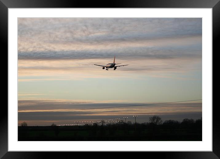 Aeroplane Landing Framed Mounted Print by Jonathan Kelly