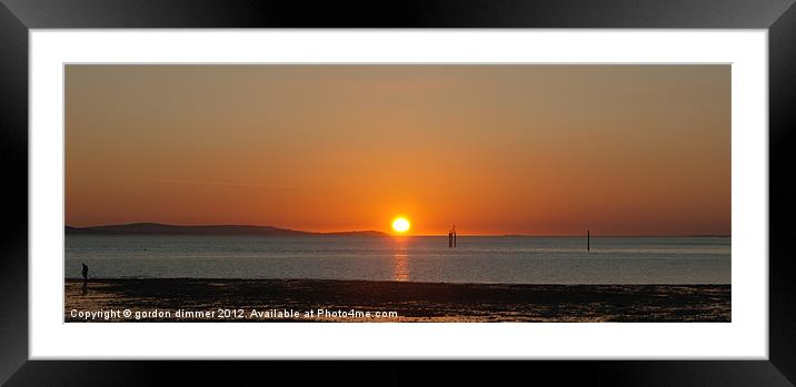 A gloriously colourful solent sunset Framed Mounted Print by Gordon Dimmer