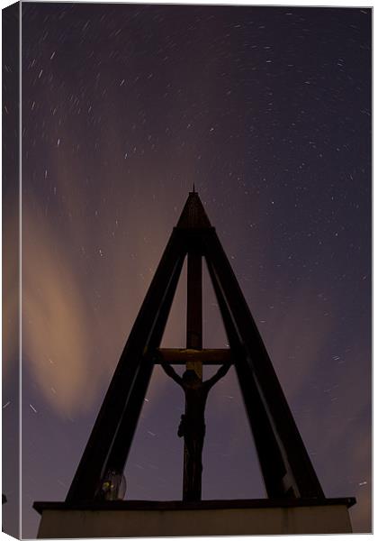 Against the stars Canvas Print by Ian Middleton