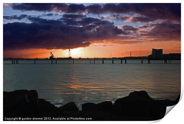 Sunrise over Fawley Print by Gordon Dimmer