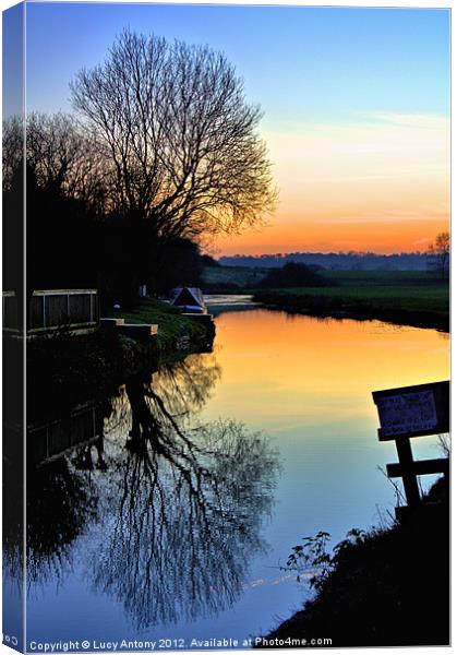 sunset on the canal Canvas Print by Lucy Antony