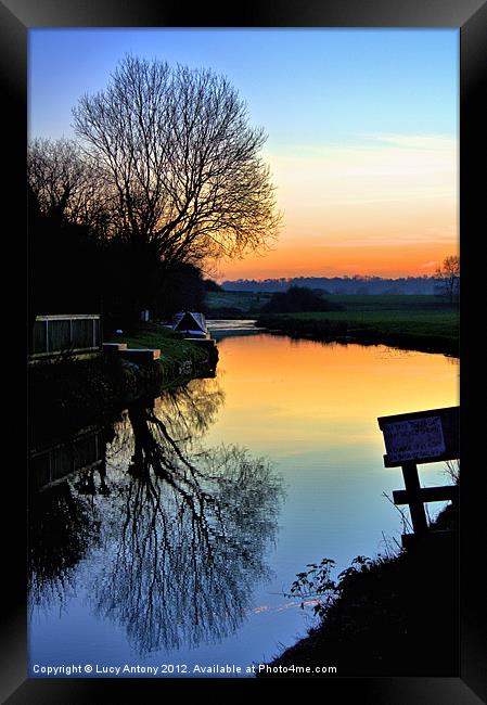 sunset on the canal Framed Print by Lucy Antony