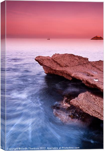 Rocks to sea with sunset Canvas Print by Keith Thorburn EFIAP/b