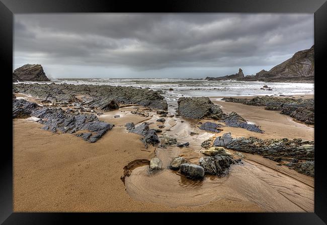 Hartland Quay at low tide Framed Print by Mike Gorton