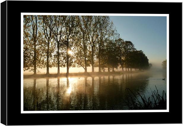 Misty Morning by the River Canvas Print by Simon Deacon