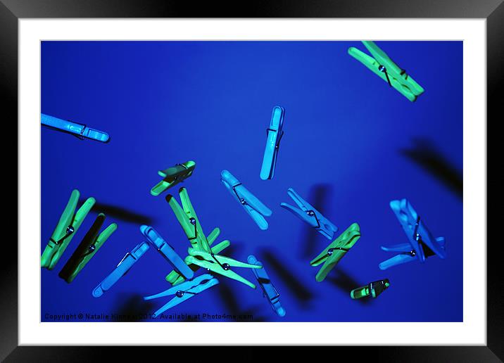 Flying Clothes Pegs Blue Background Framed Mounted Print by Natalie Kinnear