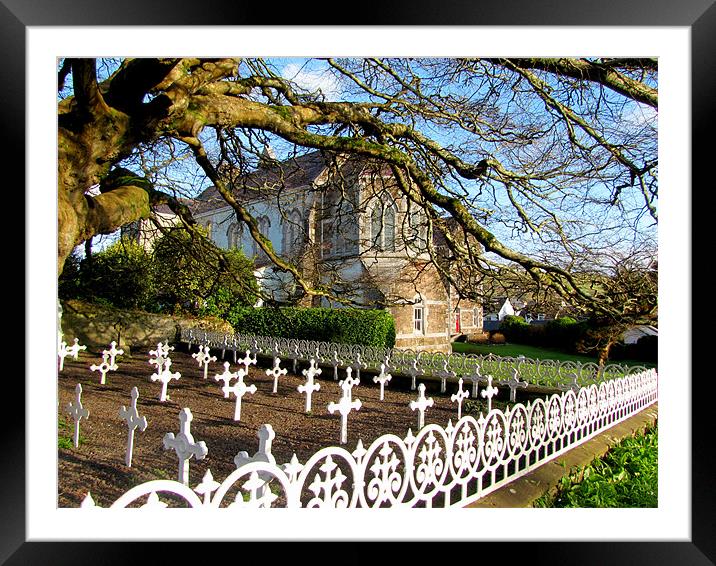 Garden and graveyard of the St. Marys church in Di Framed Mounted Print by barbara walsh