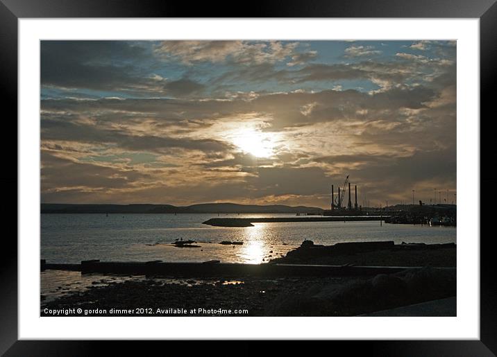 Reflections of a setting sun Framed Mounted Print by Gordon Dimmer