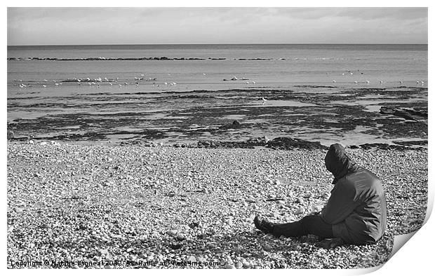 Lone Man Sitting on Pebble Beach Print by Natalie Kinnear