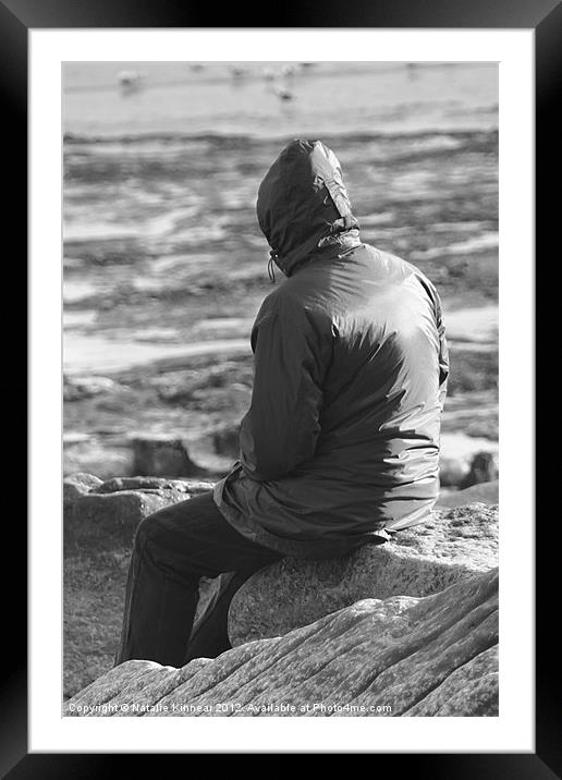 Lone Man Sitting on a Rocky Beach Framed Mounted Print by Natalie Kinnear