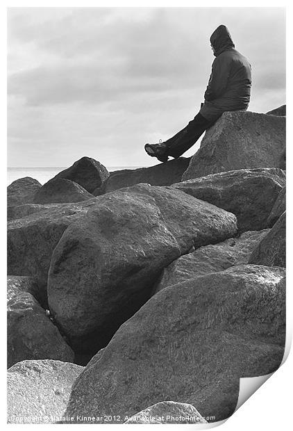 Lone Man Sitting on Rocky Beach Print by Natalie Kinnear