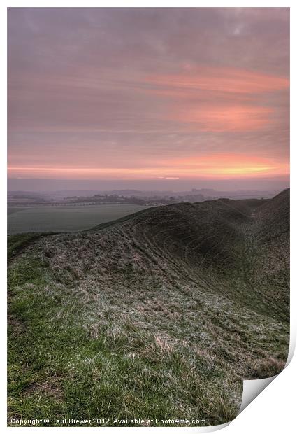 Sunrise over Maiden Castle Print by Paul Brewer