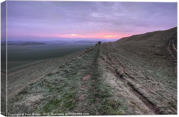 Maiden Castle At Sunrise Canvas Print by Paul Brewer