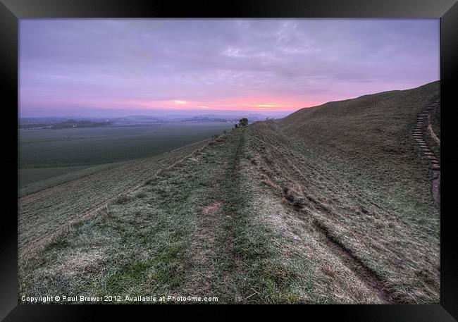 Maiden Castle At Sunrise Framed Print by Paul Brewer