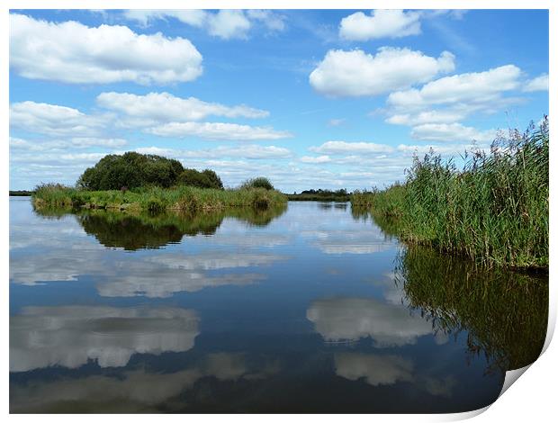 Clouds reflecting in the waters of the reed beds Print by simon brown