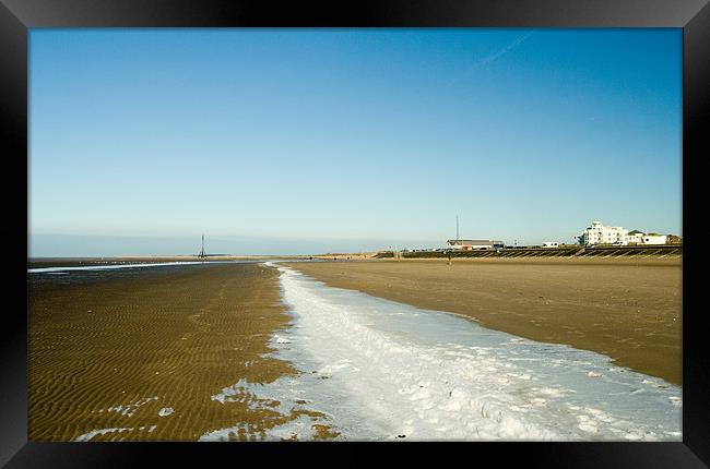 Frozen Sea at Crosby Framed Print by Wayne Molyneux