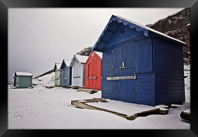 Snow Covered Beach Huts in Overstrand Framed Print by Paul Macro
