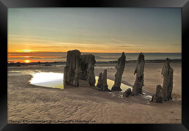 Sunset Wreck Framed Print by Fiona Messenger