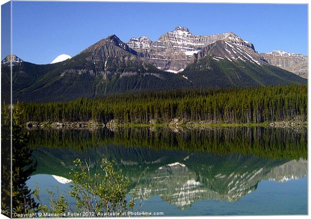 Mountain Reflection Canvas Print by Marianne Fuller