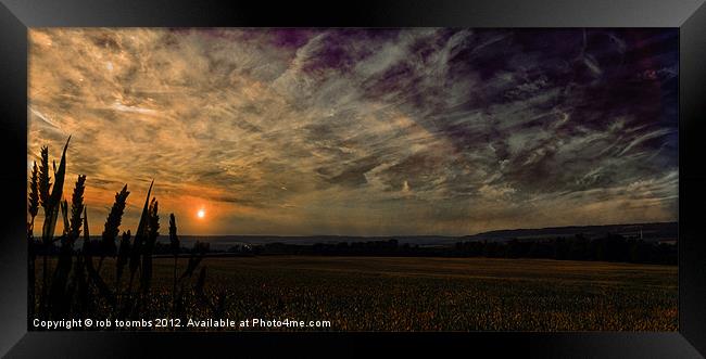 A DRAMATIC SUNSET Framed Print by Rob Toombs