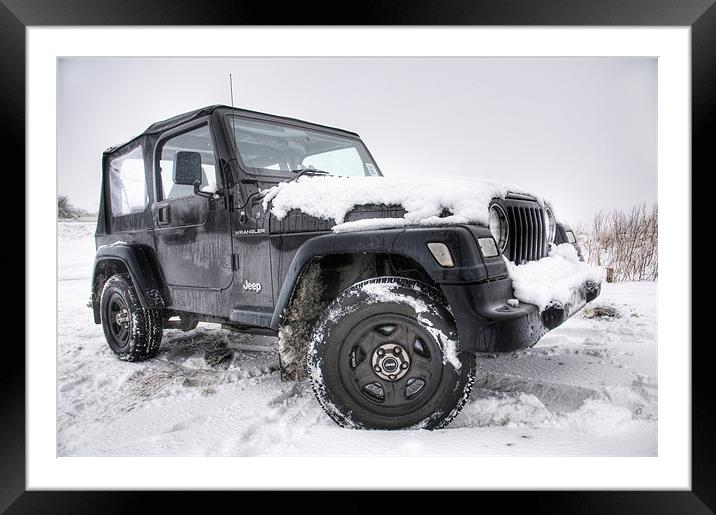 Jeep in the Snow Framed Mounted Print by Eddie Howland