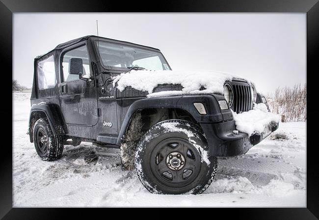Jeep in the Snow Framed Print by Eddie Howland
