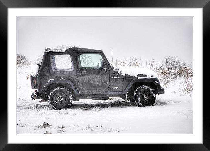 Jeep in the Snow Framed Mounted Print by Eddie Howland