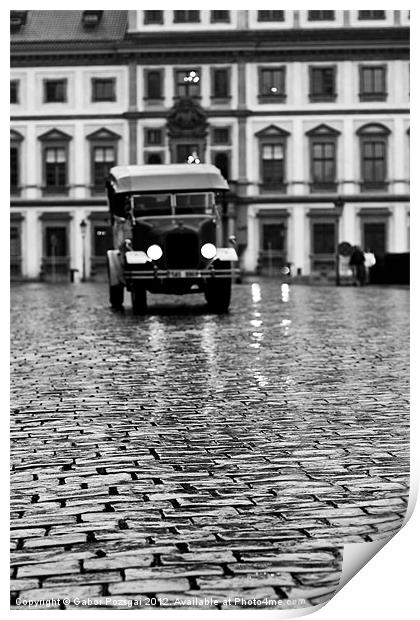 Old car approaching on cobblestone road Print by Gabor Pozsgai