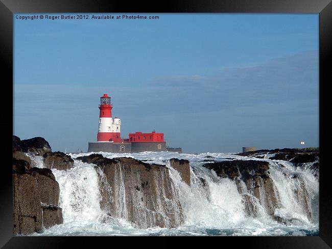 Waves Break at Longstone Lighthouse Framed Print by Roger Butler