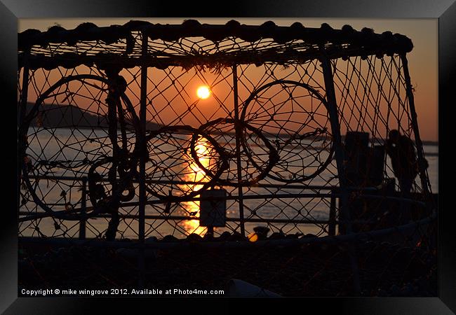 lobster pot sunset Framed Print by mike wingrove