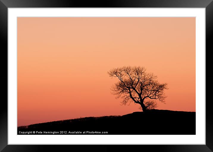 Lone tree on a hill top Framed Mounted Print by Pete Hemington