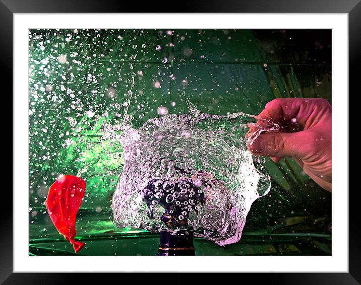pin pop water balloon Framed Mounted Print by Lee Daly