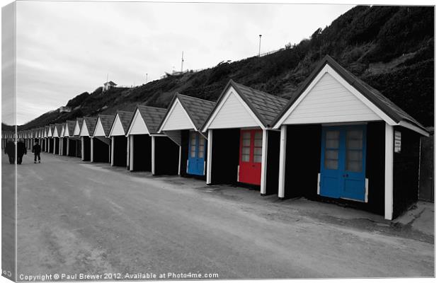 Beach Huts with a bit of colour Canvas Print by Paul Brewer