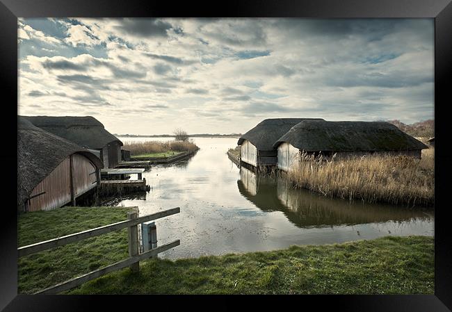 Hickling Boathouses Framed Print by Stephen Mole