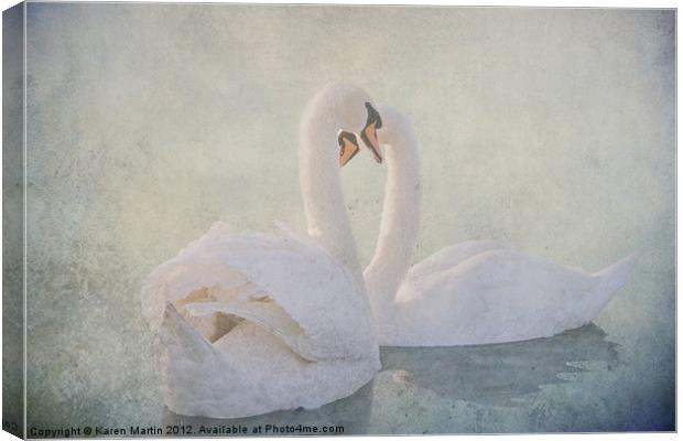 Two White Swans Canvas Print by Karen Martin