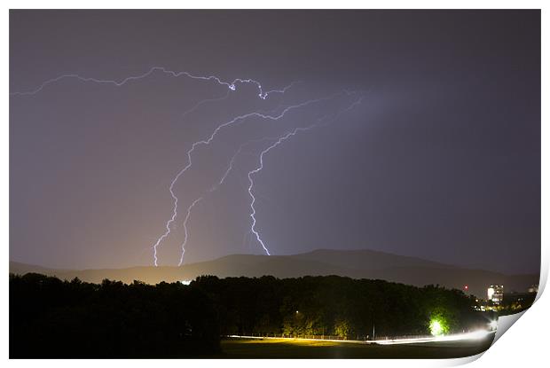 Lightning over residential area of Ljubljana Print by Ian Middleton