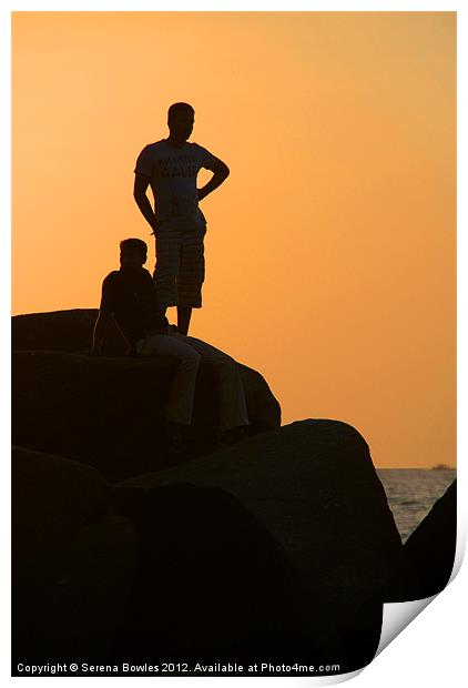 Silhouetted Figures on Rock at Sunset Palolem Print by Serena Bowles