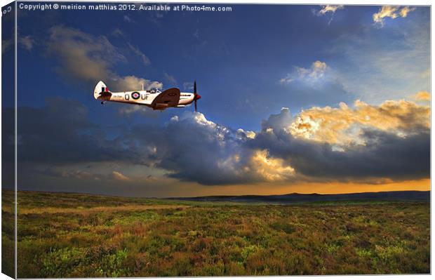 low flying evening spitfire Canvas Print by meirion matthias