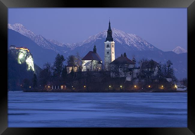 Frozen Lake Bled Framed Print by Ian Middleton