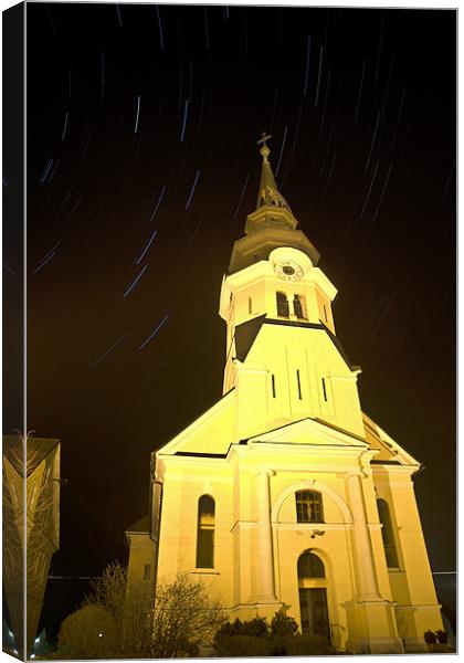 Star trails behind Vodice Church Canvas Print by Ian Middleton