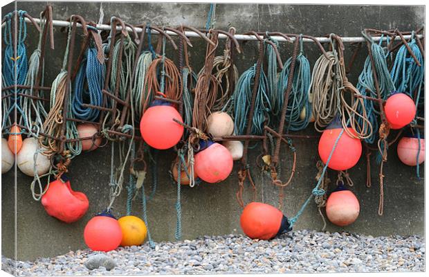 Fishing floats at Sheringham Canvas Print by Kathy Simms