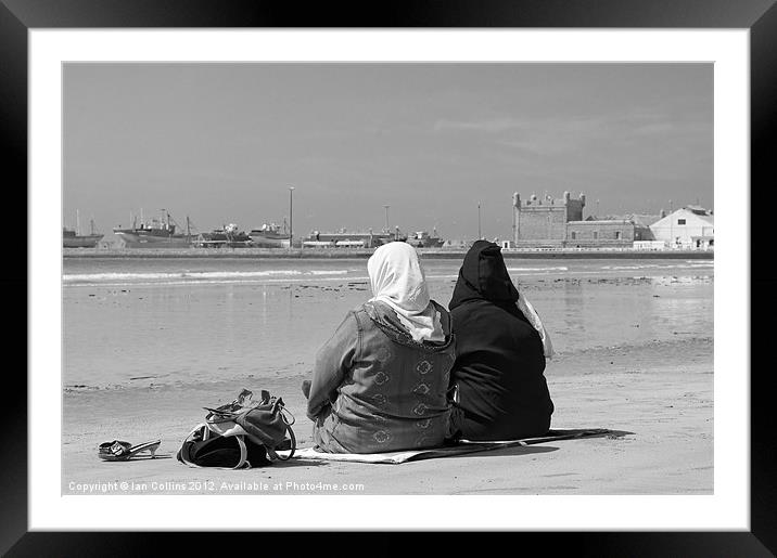 Moroccan women on beach Framed Mounted Print by Ian Collins