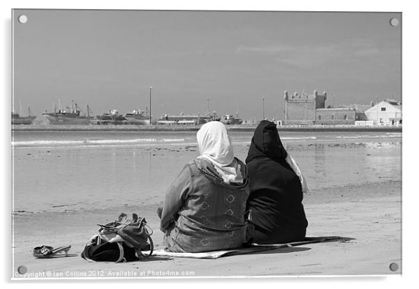Moroccan women on beach Acrylic by Ian Collins