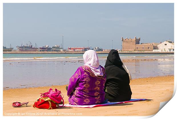 Moroccan women on beach Print by Ian Collins