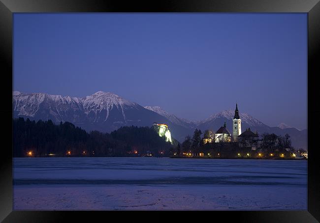 Frozen Lake Bled Framed Print by Ian Middleton