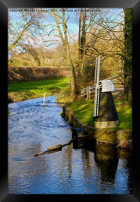 Windmill by the River Framed Print by Sean Foreman