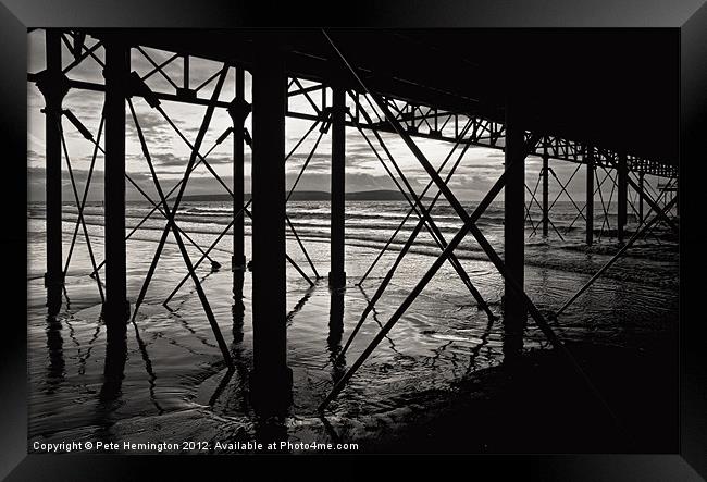 Under the pier Framed Print by Pete Hemington
