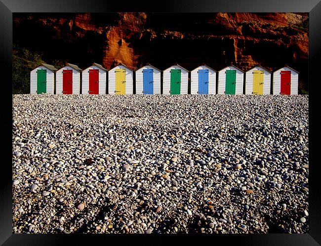 Row of colorful beach huts Framed Print by nick pautrat